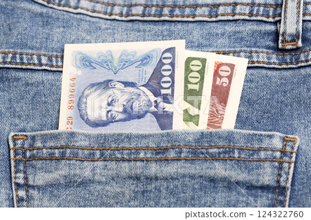 Czechoslovak koruna in the pocket of blue jeans Czechoslovak koruna in the pocket of blue jeans 124322760