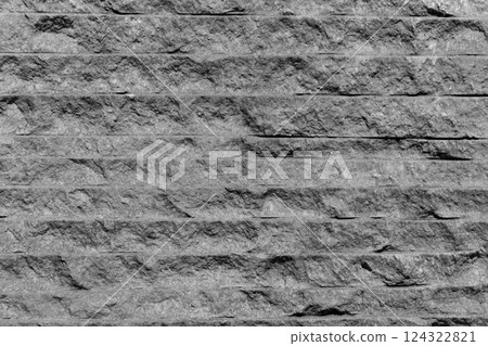 Horizontal photo of a stone wall. 124322821