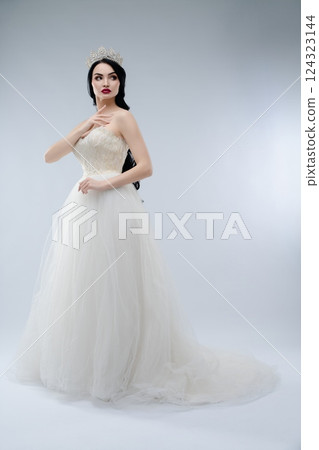 Elegant bride in stunning lingerie-inspired gown with beautiful crown 124323144