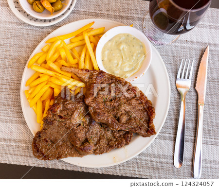 Roquefort veal steak served with fried potato Roquefort veal steak served with fried potato 124324057