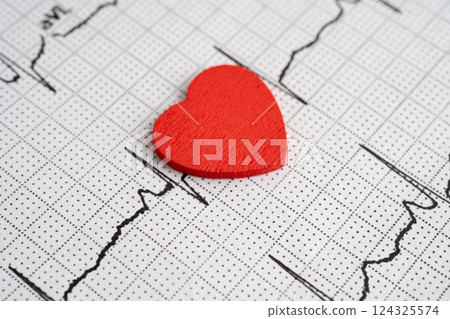 Red heart on electrocardiogram ECG with red heart, heart wave, heart attack, cardiogram report. 124325574