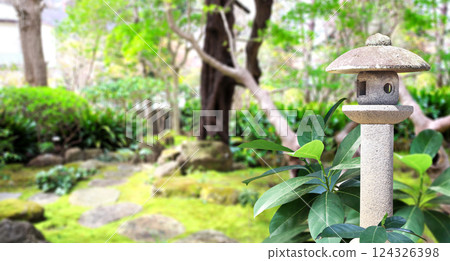 Old stone lantern at Kasuga Grand Shrine, Nara Japan. Picturesque landscape with ancient japanese lantern in Kasuga-Taisha Shrine. Topic of vacation, travel, trip abroad on vacation, cruises and tours 124326398