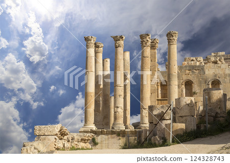 Temple of Zeus, Jordanian city of Jerash (Gerasa of Antiquity), capital and largest city of Jerash Governorate, Jordan. Against the background of a beautiful sky with clouds Temple of Zeus, Jordanian city of Jerash (Gerasa of Antiquity), capital and largest city of Jerash Governorate, Jordan. Against the background of a beautiful sky with clouds 124328743