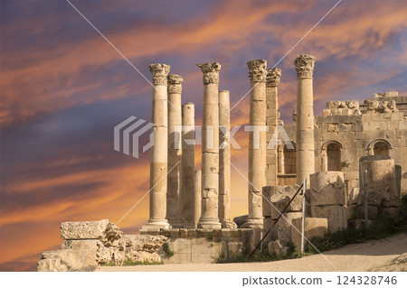 Temple of Zeus, Jordanian city of Jerash  (Gerasa of Antiquity), capital and largest city of Jerash Governorate, Jordan. Against the background of a beautiful sky with clouds 124328746
