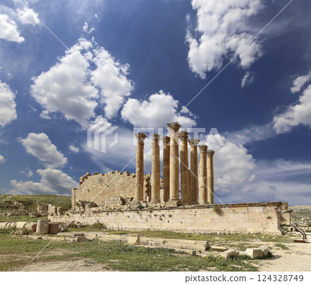 Temple of Zeus, Jordanian city of Jerash  (Gerasa of Antiquity), capital and largest city of Jerash Governorate, Jordan. Against the background of a beautiful sky with clouds 124328749