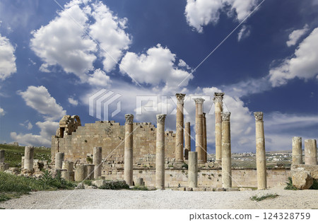 Temple of Zeus, Jordanian city of Jerash (Gerasa of Antiquity), capital and largest city of Jerash Governorate, Jordan. Against the background of a beautiful sky with clouds Temple of Zeus, Jordanian city of Jerash (Gerasa of Antiquity), capital and largest city of Jerash Governorate, Jordan. Against the background of a beautiful sky with clouds 124328759