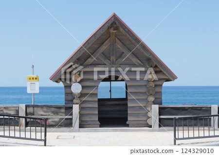 Bus stop at Shirato Beach with blue sky and sea Bus stop at Shirato Beach with blue sky and sea 124329010