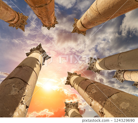 Roman Columns in the Jordanian city of Jerash (Gerasa of Antiquity), capital and largest city of Jerash Governorate, Jordan. Against the background of a beautiful sky with clouds Roman Columns in the Jordanian city of Jerash (Gerasa of Antiquity), capital and largest city of Jerash Governorate, Jordan. Against the background of a beautiful sky with clouds 124329690