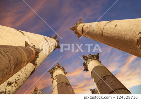 Roman Columns in the Jordanian city of Jerash (Gerasa of Antiquity), capital and largest city of Jerash Governorate, Jordan. Against the background of a beautiful sky with clouds Roman Columns in the Jordanian city of Jerash (Gerasa of Antiquity), capital and largest city of Jerash Governorate, Jordan. Against the background of a beautiful sky with clouds 124329716