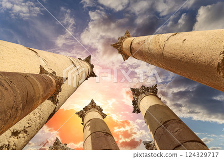 Roman Columns in the Jordanian city of Jerash (Gerasa of Antiquity), capital and largest city of Jerash Governorate, Jordan. Against the background of a beautiful sky with clouds Roman Columns in the Jordanian city of Jerash (Gerasa of Antiquity), capital and largest city of Jerash Governorate, Jordan. Against the background of a beautiful sky with clouds 124329717