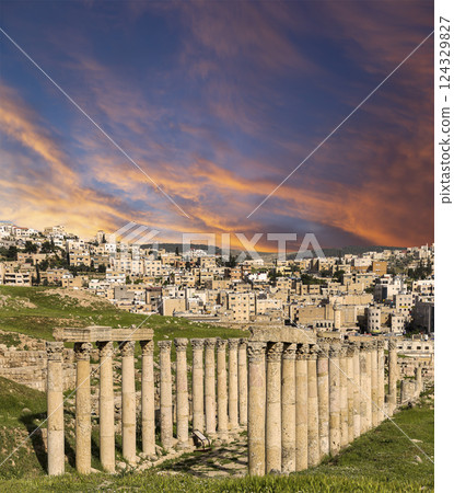 Roman Columns in the Jordanian city of Jerash (Gerasa of Antiquity), capital and largest city of Jerash Governorate, Jordan. Against the background of a beautiful sky with clouds Roman Columns in the Jordanian city of Jerash (Gerasa of Antiquity), capital and largest city of Jerash Governorate, Jordan. Against the background of a beautiful sky with clouds 124329827