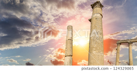 Roman Columns in the Jordanian city of Jerash (Gerasa of Antiquity), capital and largest city of Jerash Governorate, Jordan. Against the background of a beautiful sky with clouds Roman Columns in the Jordanian city of Jerash (Gerasa of Antiquity), capital and largest city of Jerash Governorate, Jordan. Against the background of a beautiful sky with clouds 124329865