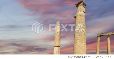 Roman Columns in the Jordanian city of Jerash (Gerasa of Antiquity), capital and largest city of Jerash Governorate, Jordan. Against the background of a beautiful sky with clouds 124329867
