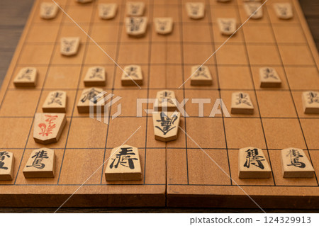 Shogi board and shogi pieces in checkmate Shogi board and shogi pieces in checkmate 124329913