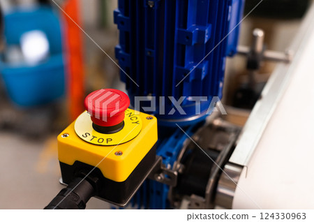 A red Emergency STOP button used for safety on industrial equipment, machine machinery electrical system emergency shutdown mechanism, nuclear power plant, factory, workers safety security concept A red Emergency STOP button used for safety on industrial equipment, machine machinery electrical system emergency shutdown mechanism, nuclear power plant, factory, workers safety security concept 124330963