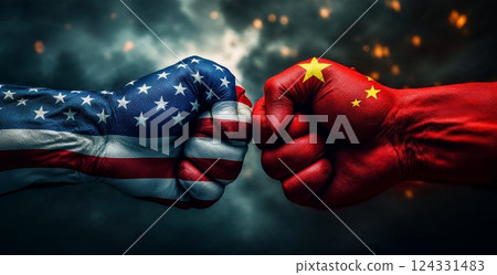 American and chinese flags painted on two fists hitting each other, representing the political and economic conflict between the two countries 124331483