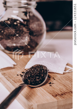 Close-up of tea bag, loose tea Close-up of tea bag, loose tea 124331651