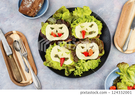 Mini sandwiches with monster faces. Mini sandwiches with monster faces. 124332001
