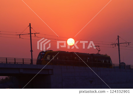 Utsunomiya City: LRT (next-generation streetcar) and sunset 124332901