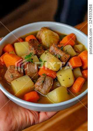 Irish stew with beef, potatoes and carrots cooking in bowl Irish stew with beef, potatoes and carrots cooking in bowl 124333268