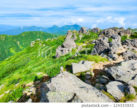Hiuchi and Myoko mountain climbing in summer (view of Mt. Hiuchi from the south peak of Mt. Myoko) 124333933