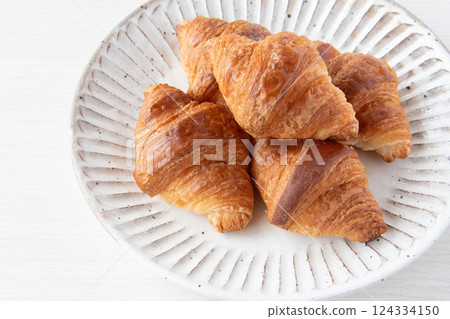 Freshly baked croissant Freshly baked croissant 124334150