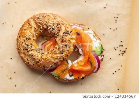 Lox bagel. A sandwich with smoked salmon and fresh vegetables 124334567