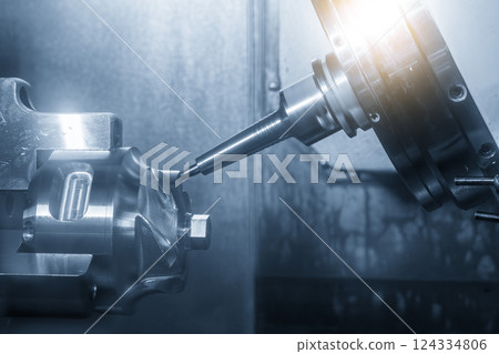 The 5-axis CNC milling machine multi-tasking type finish cutting the automotive part with solid ball nose end mill tool. The 5-axis CNC milling machine multi-tasking type finish cutting the automotive part with solid ball nose end mill tool. 124334806