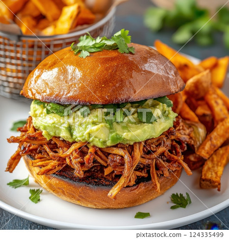 National BBQ Week Pulled pork sandwich with avocado and sweet potato fries on plate National BBQ Week Pulled pork sandwich with avocado and sweet potato fries on plate 124335499
