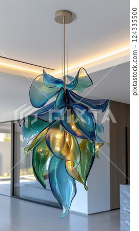 Modern multicolored glass chandelier in contemporary interior setting 124335500