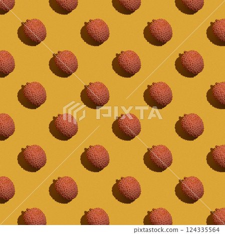 Lychee fruit on a orange or a yellow background, lychees pattern 124335564