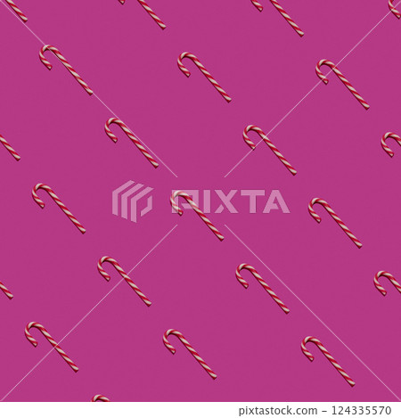 Red-white candy cane on a pink background. Concept of Christmas pattern. Candy background. 124335570