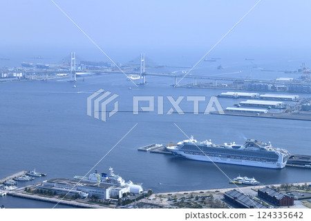 Yokohama cityscape in Japan. First arrival. Europa II approaching Yokohama Bay Bridge on March 25th. Yokohama cityscape in Japan. First arrival. Europa II approaching Yokohama Bay Bridge on March 25th. 124335642