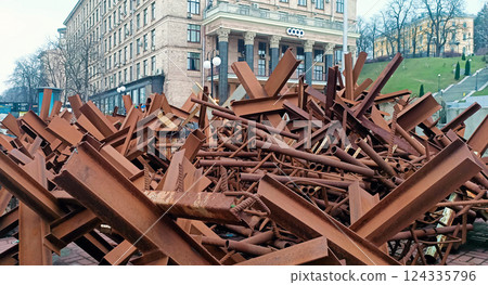 Kyiv, Ukraine March 15, 2024: A huge number of anti-tank barrier hedgehogs on the main street in Kyiv Kyiv, Ukraine March 15, 2024: A huge number of anti-tank barrier hedgehogs on the main street in Kyiv 124335796