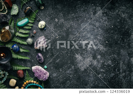 Healing Crystals and Ferns on Dark Background 124336019