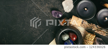 Rustic Aromatherapy and Healing Crystal Arrangement on Dark Background 124336026