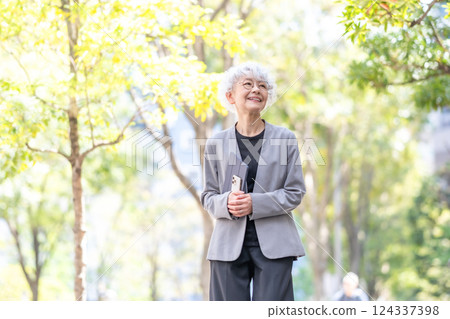 Senior woman business fresh greenery Senior woman business fresh greenery 124337398