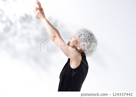 Stretching massage gray hair woman Stretching massage gray hair woman 124337442