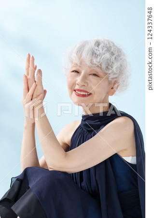 Beauty Senior Woman Sitting 124337648
