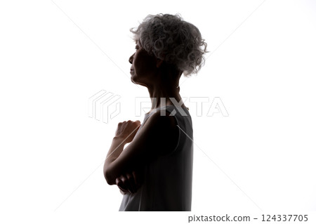 Senior female silhouette worried Senior female silhouette worried 124337705