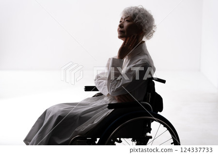 Wheelchair senior female silhouette 124337733