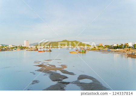 The river is in the city. 124337814