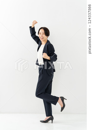 Woman business whole body fist pump 124337866