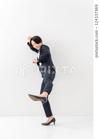 Female business whole body kick 124337869