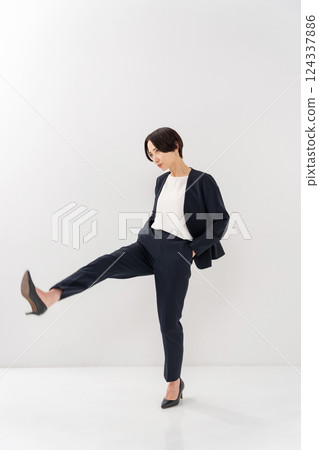 Female business whole body kick 124337886