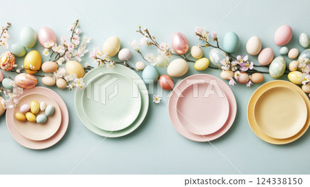 Pastel Easter table setting banner. Color pastel Easter eggs, blank plates, blue backdrop flat lay. Pastel Easter table setting banner. Color pastel Easter eggs, blank plates, blue backdrop flat lay. 124338150