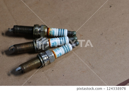 Spark plugs that have reached the end of their life Spark plugs that have reached the end of their life 124338976