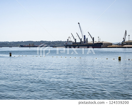 Comercial harbour with cranes in La Coruna in Spain 124339200
