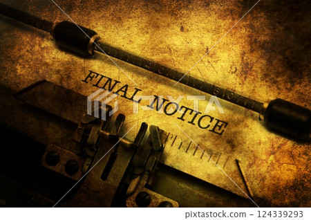 Final notice in typewriter 124339293