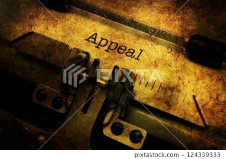 Appeal text on vintage typewriter 124339333